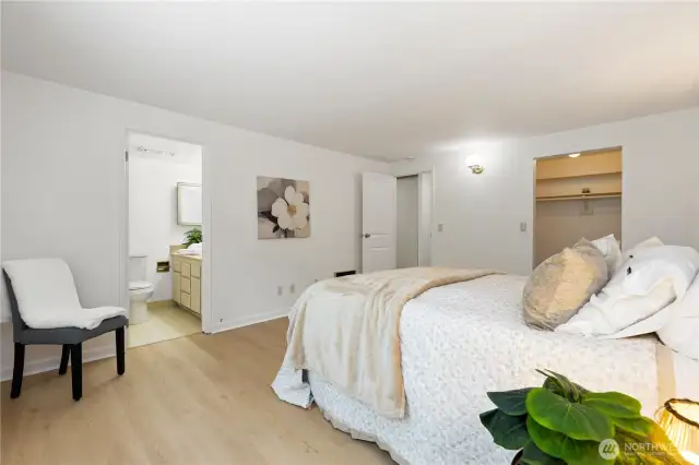 Second view of this updated primary bedroom with 3 piece bathroom and large walk in closet