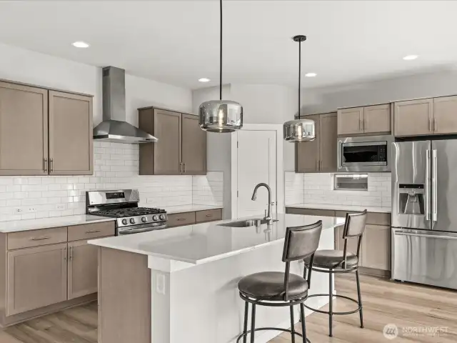 Beautiful modern kitchen awaits your culinary experience.
