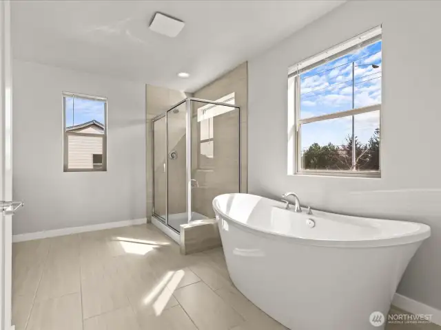 Five piece Primary Suite offers a spa like experience!