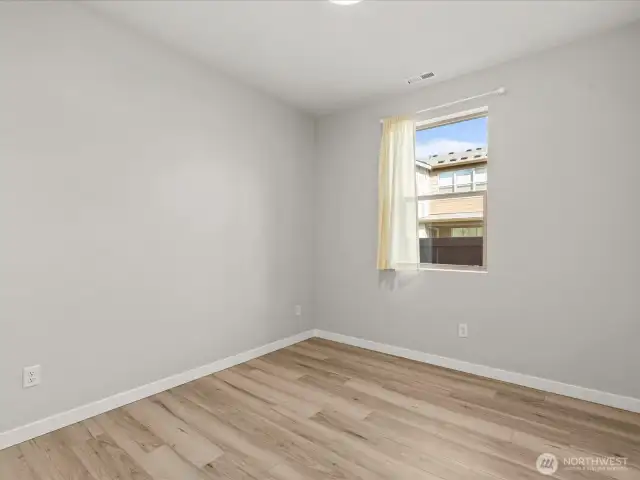 Main floor guest suite with luxurious LVP flooring