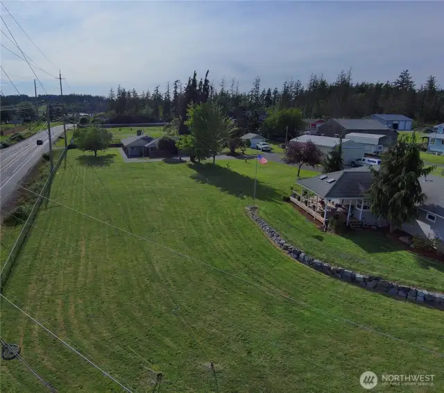 Farthest away is the main home with double garage... to the right another garage used for lawn equipment... then the shop... and finally the guest cottage, which has an oversized garage for storage...