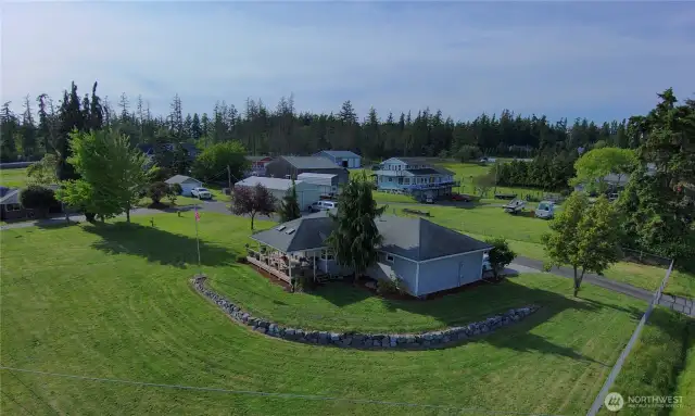 Angle from the easterly edge of the property with the guest home nearest...