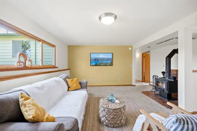 Bonus room has a wood stove and direct access to the backyard.
