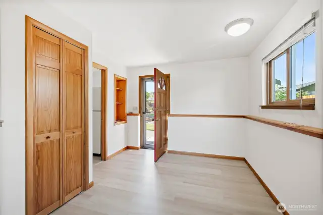 Downstairs flex space for crafts, game table or install a kitchenette. Door leads to the backyard.