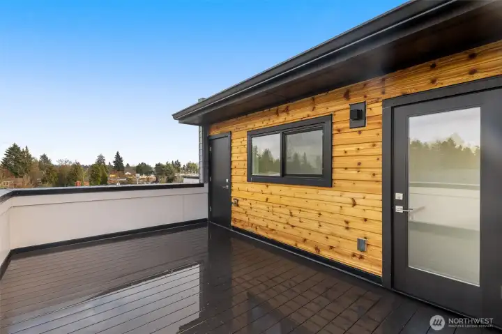 A full rooftop deck offers endless possibilities — outdoor dining, evening stargazing, and gatherings with panoramic neighborhood views. Photos are of model home with similar fixtures & finishes.
