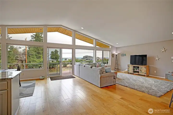 Open floor plan, vaulted ceilings, beautiful floors and sunrise views!