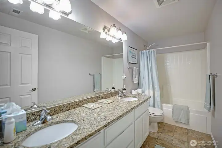 Full guest bathroom on lower level.