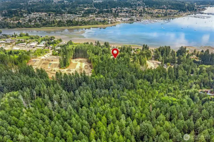 This 5.16 acre parcel is connected to sewer and has a single party well.