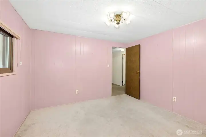 Second of the three bedrooms.