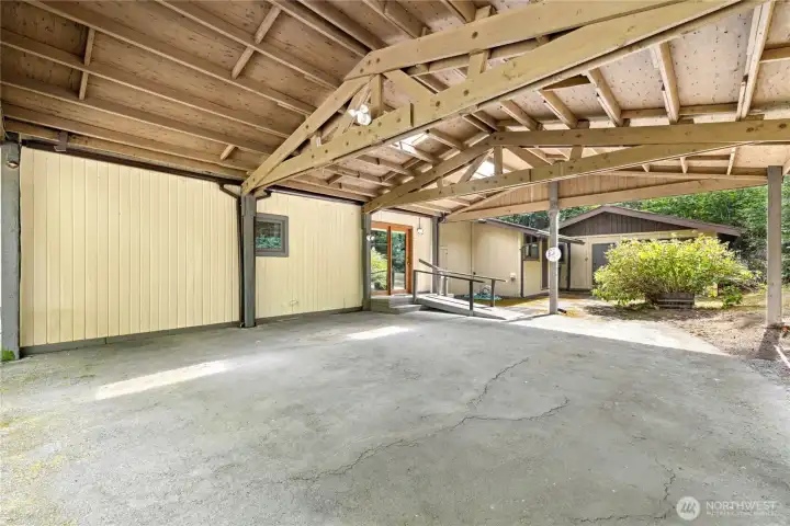 Two-car covered carport on site.