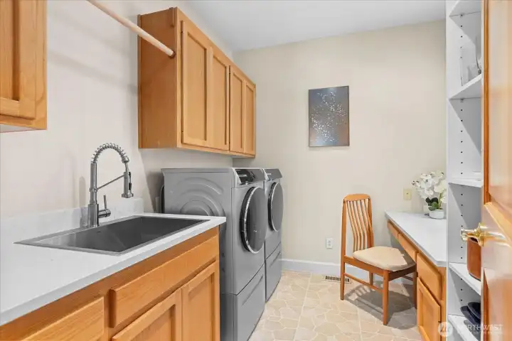 Large laundry room, deep sink, new Miele Washer & Dryer, planning desk and storage for ovesized appliances & Costco
