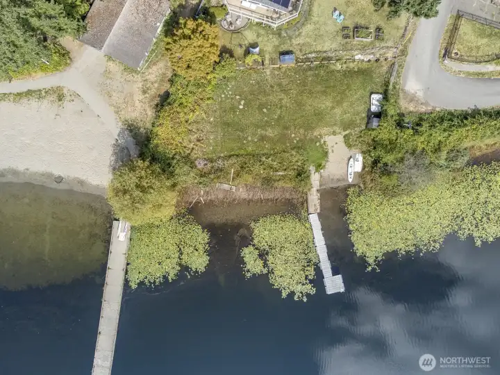 The lakefront parcel is owned and available to all 30 homeowners on Ibberson Drive (east and west).  What a unique "bonus".