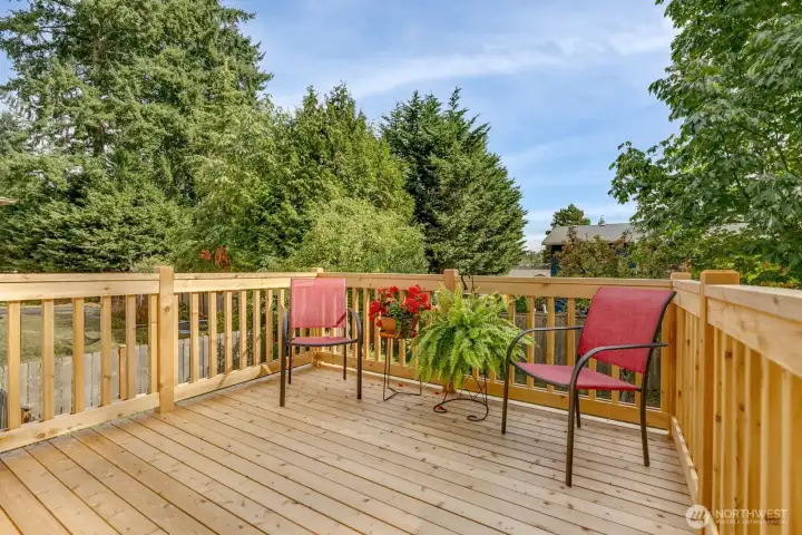 Deck off of dining area...enjoy sitting outdoors for evening "wind down".