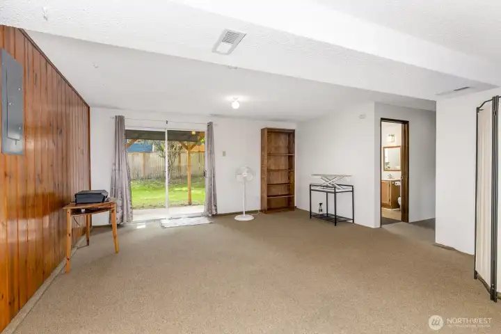Rec room looking out to patio and backyard.