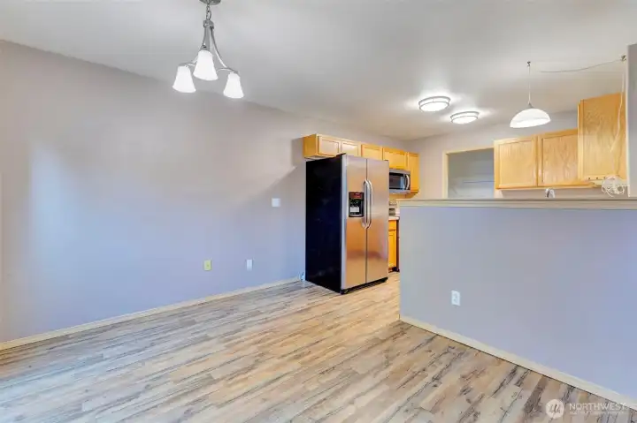 The dining area is open to the kitchen and the family room.