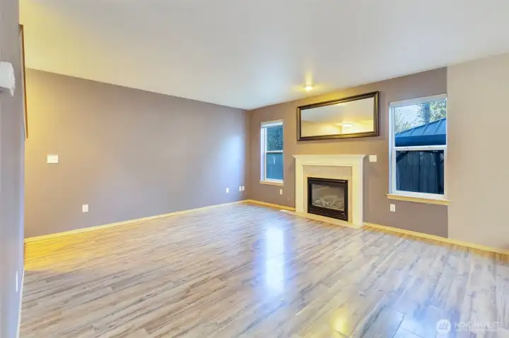 The family room with fireplace invites relaxation.