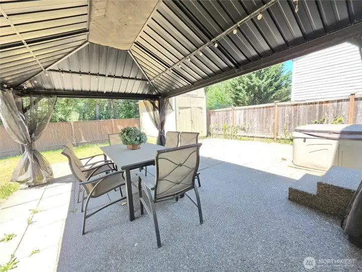 Enjoy and relax in the gazebo year-round.
