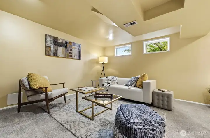Fresh paint, updated carpet and tall ceilings make the lower level feel spacious and light.