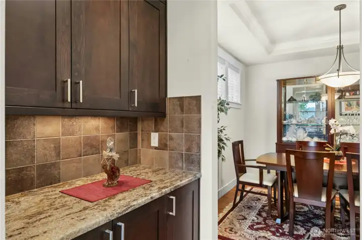 Butler pantry. Coffee bar. Pantry area between kitchen and dining room.