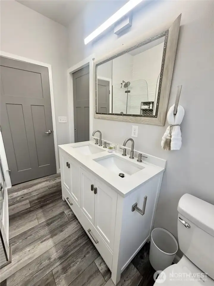 Downstairs primary suite double vanity
