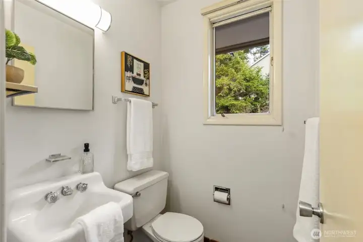 Here is the ½ bath connected to this private space