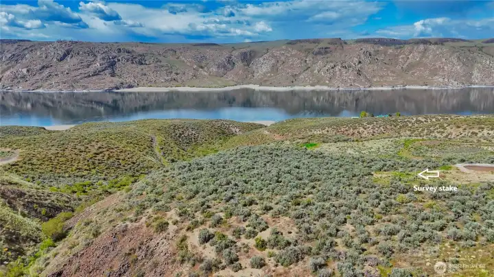 Imagine your forever or seasonal home here. Contiguous parcel with domestic/irrigation water hookups.