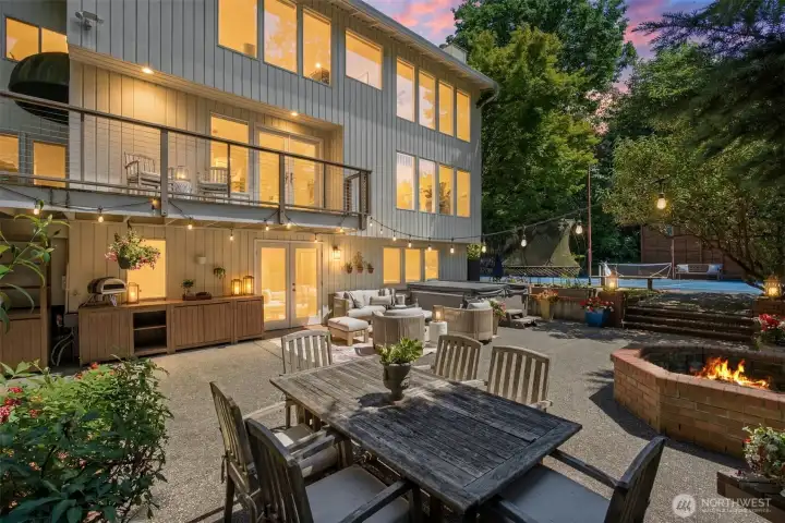 Exceptional outdoor spaces with sprawling patio, built-in seating & fire pit