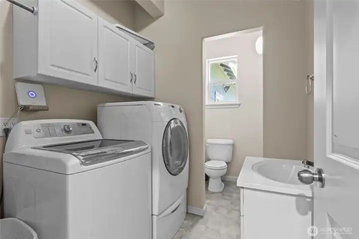 Laundry With Sink and Toilet