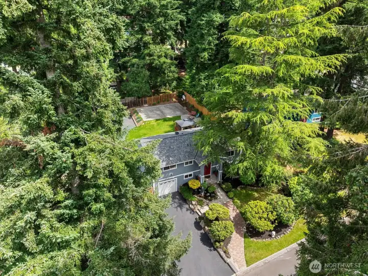 This home is set on a beautiful sunny lot in a quiet cul-de-sac surrounded by mature landscaping that provides excellent privacy.
