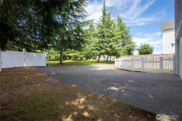 extended driveway and additional side fenced area