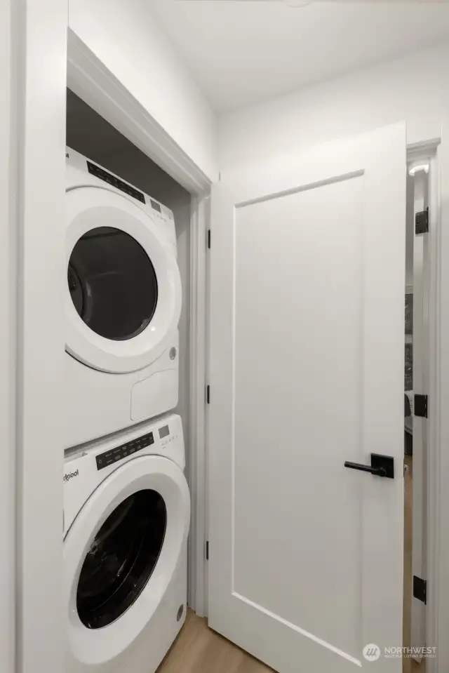 Convenience meets efficiency with an in-unit laundry closet featuring a stackable washer and dryer. Tucked away for easy access, it ensures daily chores are a breeze.