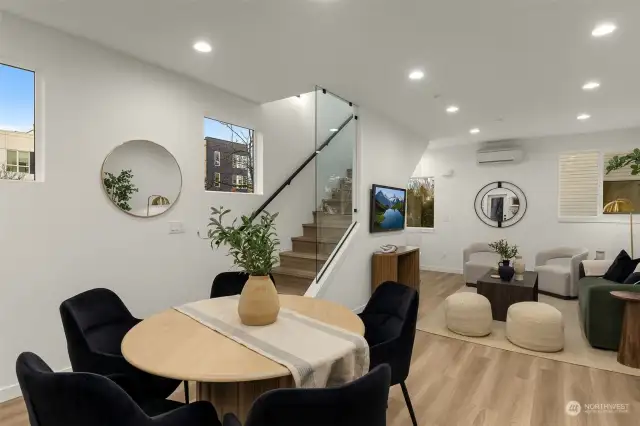 Let natural light fill this warm dining space, where modern design meets comfort.