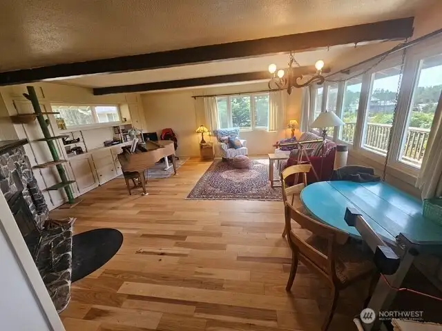 So much natural light and beautiful new wood flooring.