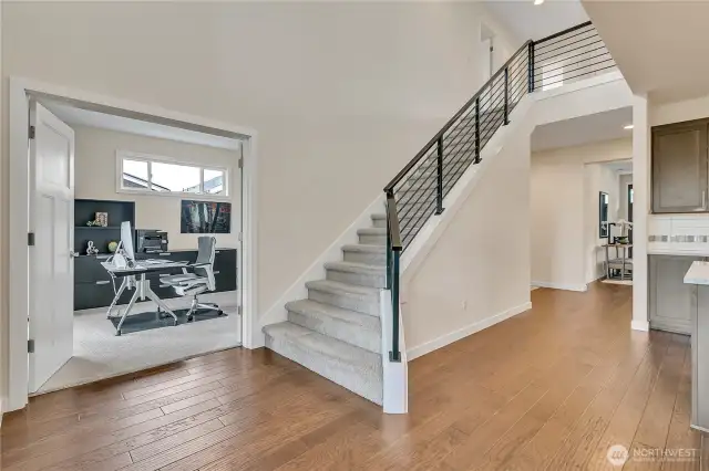 Open staircase and lower level den or bedroom
