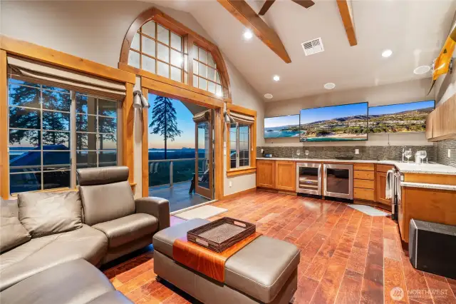 Private guest suite above the gorgeous  garage offers privacy and luxury with private terrace and 3/4 bath.