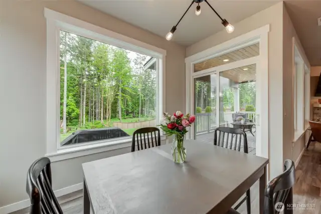 Dining area with that gorgeous green view beyond