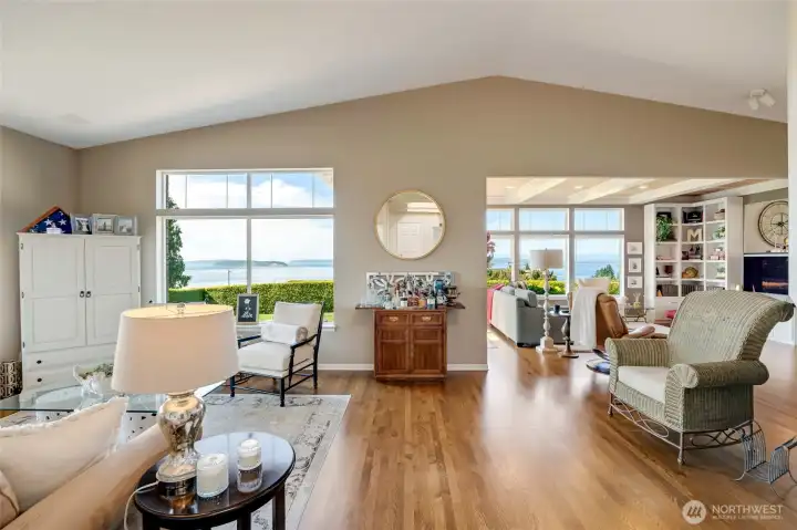 Vaulted ceiling and several windows allow natural light.