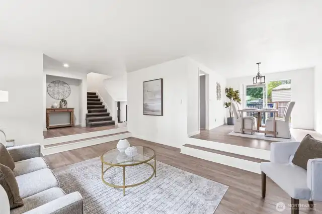 Step inside to light and bright.  LVP floors, fresh paint, and simply delightful