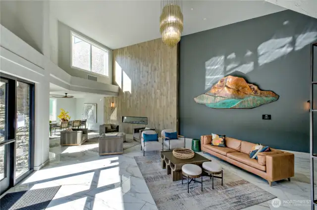 First impressions matter—and this one delivers.  Step inside the grand lobby of the Rainier building and you’ll feel the intention behind every detail. Artful design, soaring ceilings, and plenty of gathering space set the tone for an elevated experience. Whether you're welcoming friends or taking a moment for yourself before heading out, this entryway feels more like a boutique hotel than a typical condo.