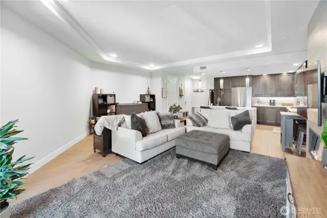 Room to breathe, space to grow.  With generous wall space and 9-foot ceilings, this living area feels far larger than its footprint. Create your own media zone, add a reading nook, or simply stretch out and enjoy the sense of openness—ideal for a remote workspace or unwinding after a walk along the waterfront.