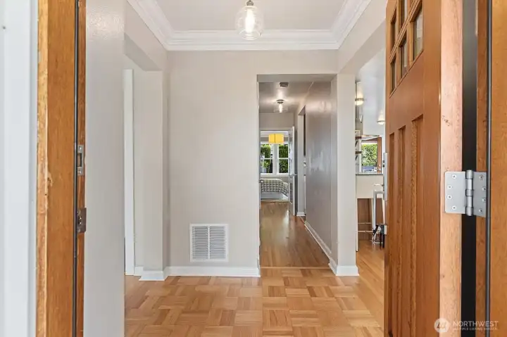 The charm of the 1940’s is still present in the recently refinished hardwood floors, cove moulding, and classic layout.
