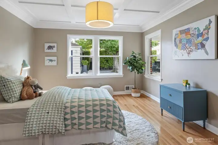 Flexible 2nd main-floor bedroom—spacious enough for double twins or a queen. Versatile layout also works beautifully as a den/family room.