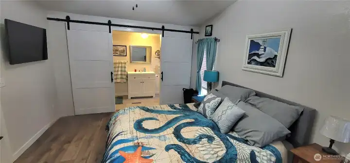 Primary bedroom with ensuite bathroom.