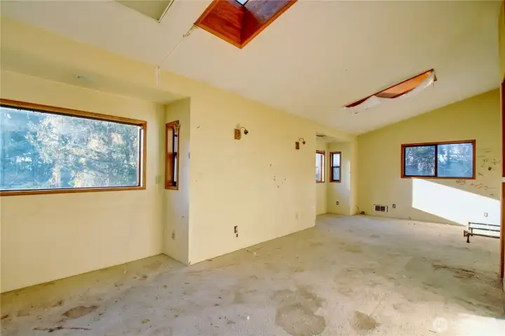 Large primary on the second floor spans the front of the house.