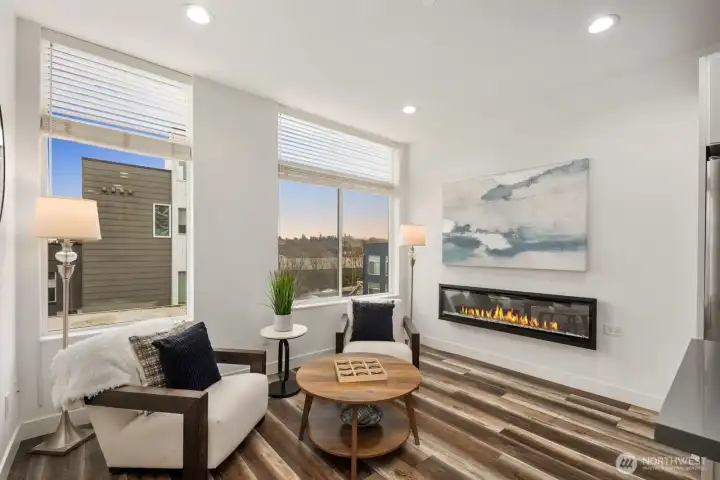 Middle floor living room is filled with light from the eastern horizon.