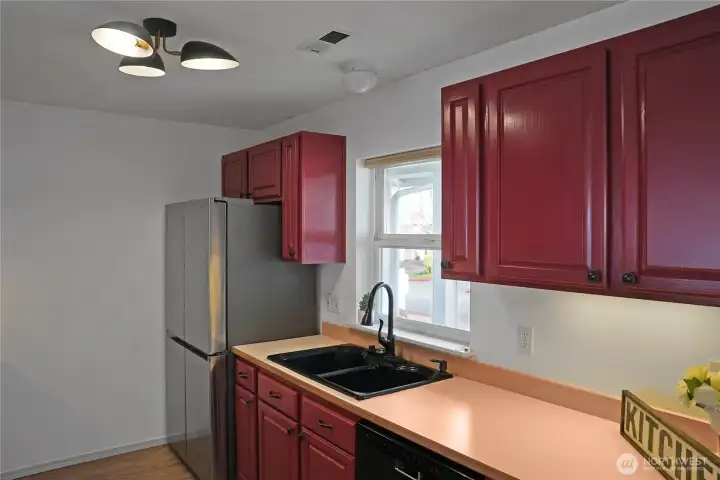 Kitchen with newer Stainless-Steel Appliances.