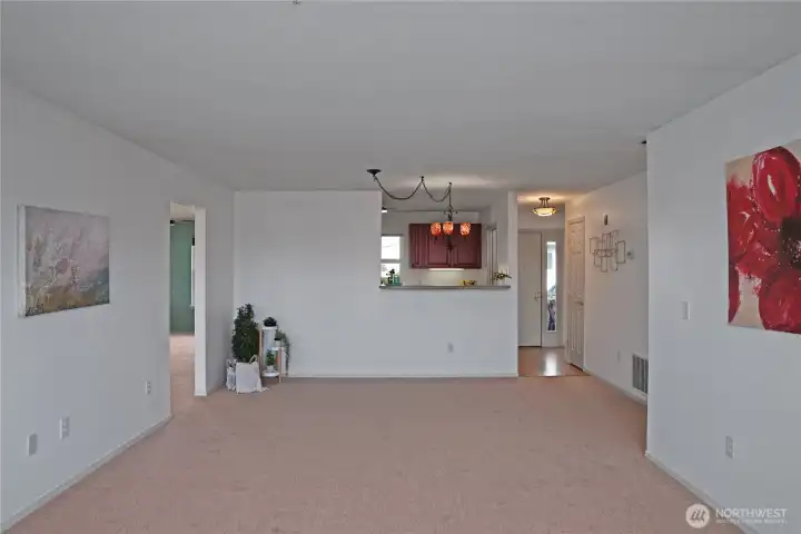 The kitchen connects to the living room!