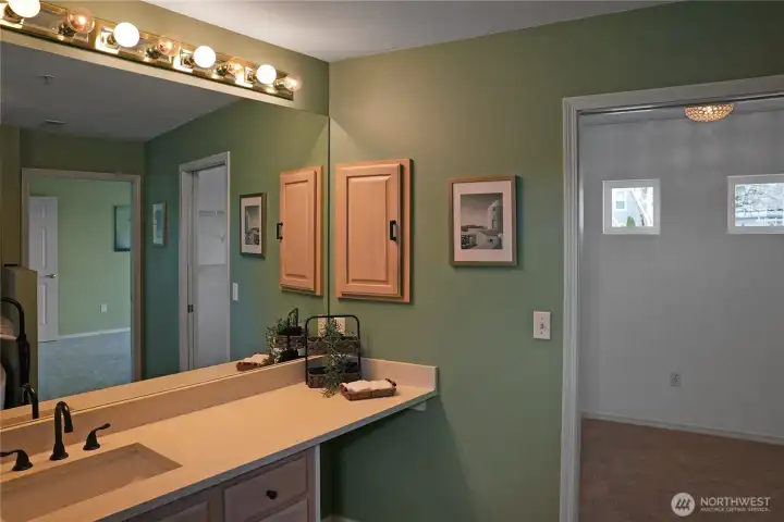 Primary Bathroom leading to Walk-in Closet.