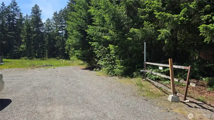 Sign will be straight ahead, park at end of gravel and walk straight ahead. Sign will be straight ahead, park at end of gravel and walk straight ahead.