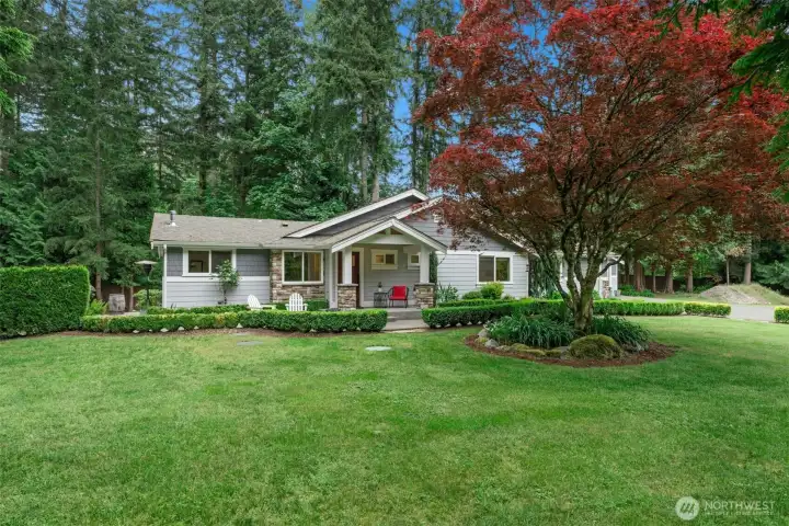 Charming and beautifully updated private 1.12-acre retreat